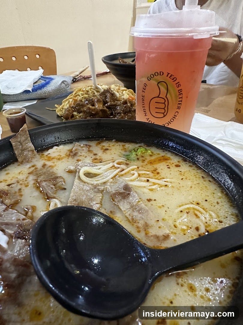 Close-up of noodle soup and drink