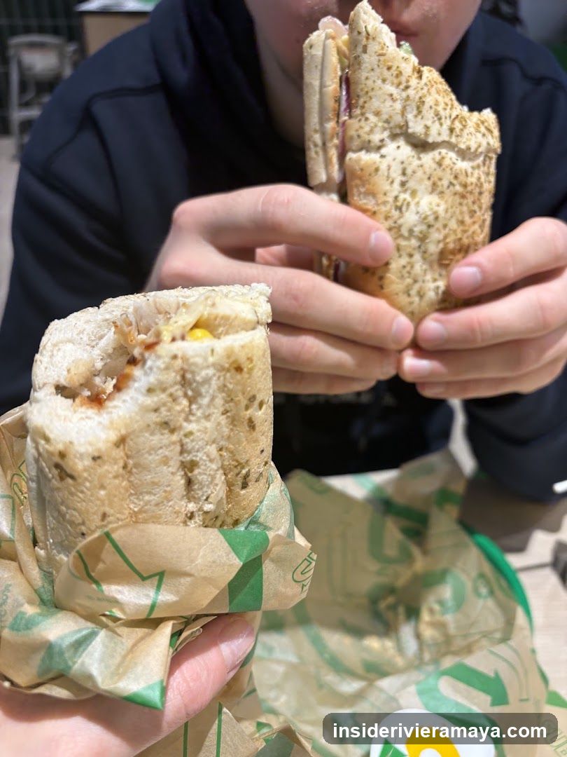 Hand holding a sandwich