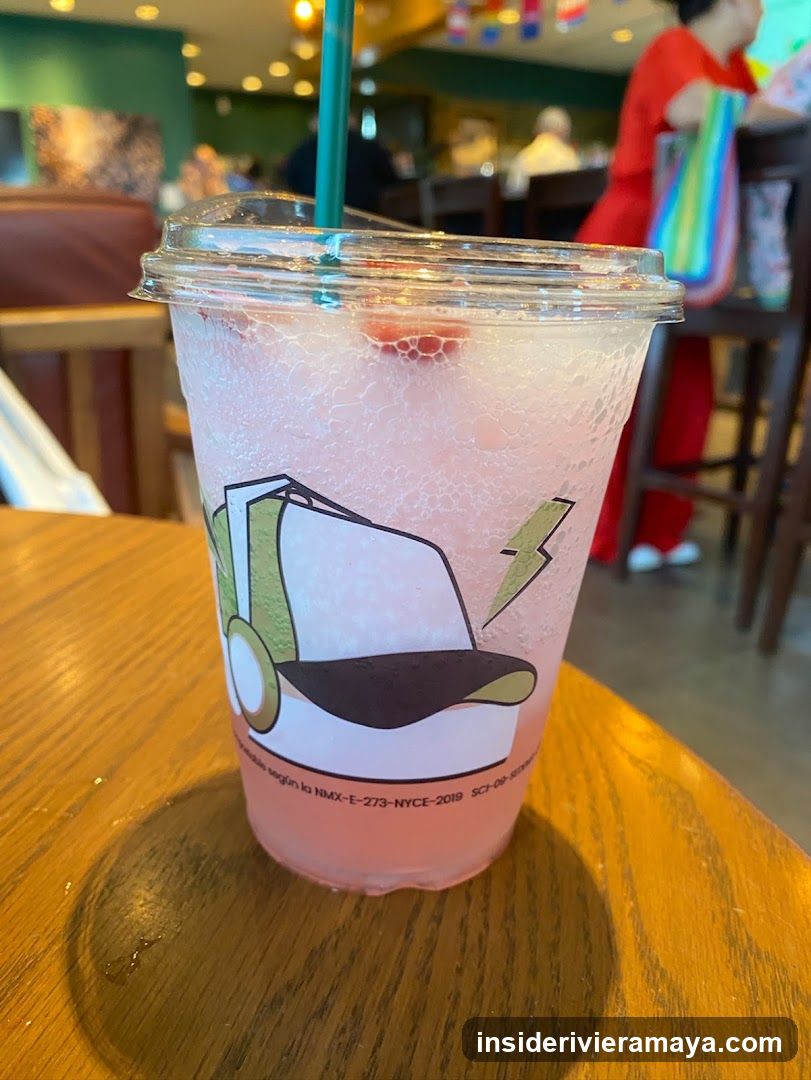 Pink beverage in a plastic cup