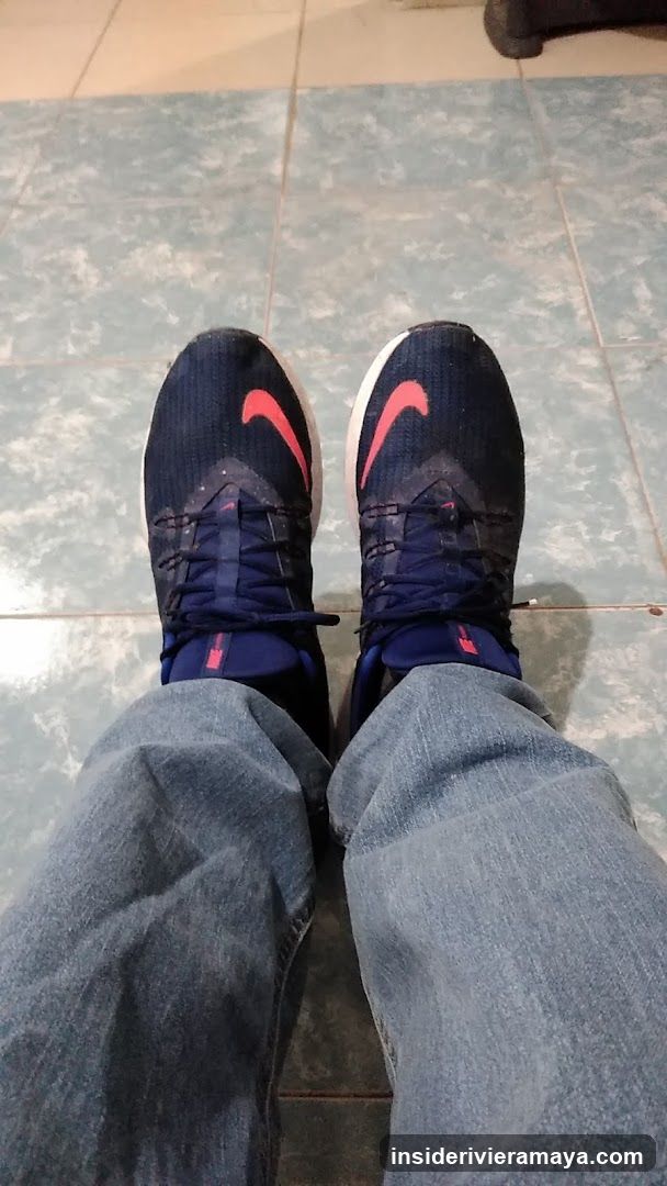 View of feet in sneakers