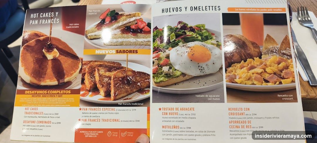 A printed menu page featuring breakfast items, divided into sections for 'Desayunos Completos' and 'Huevos y Omelettes'. The page includes photographs of various dishes like pancakes, French toast, avocado toast, and croissant-based meals.