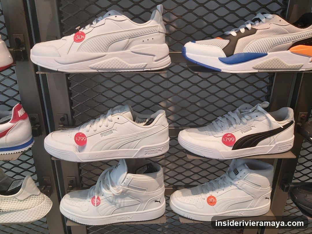 Display of White Puma Sneakers