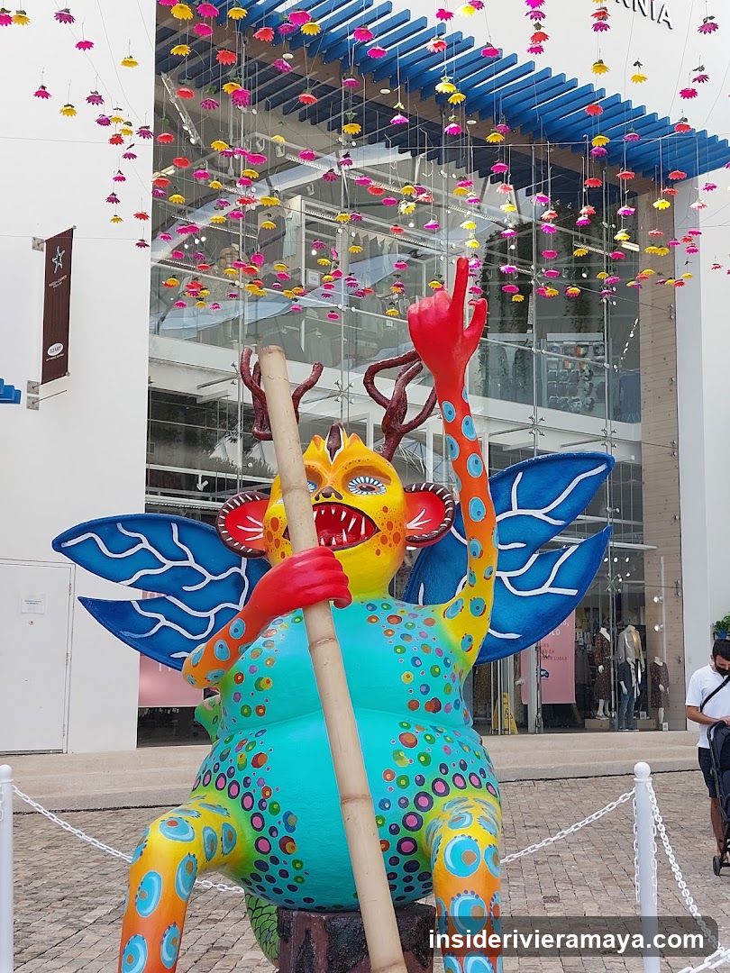 Colorful Sculpture in Front of Building